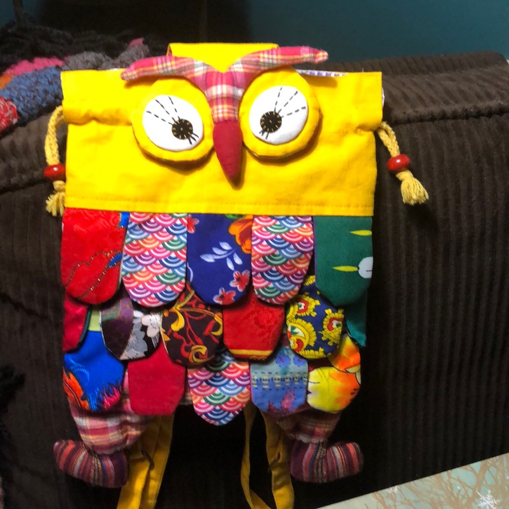 Small adorable owl backpack